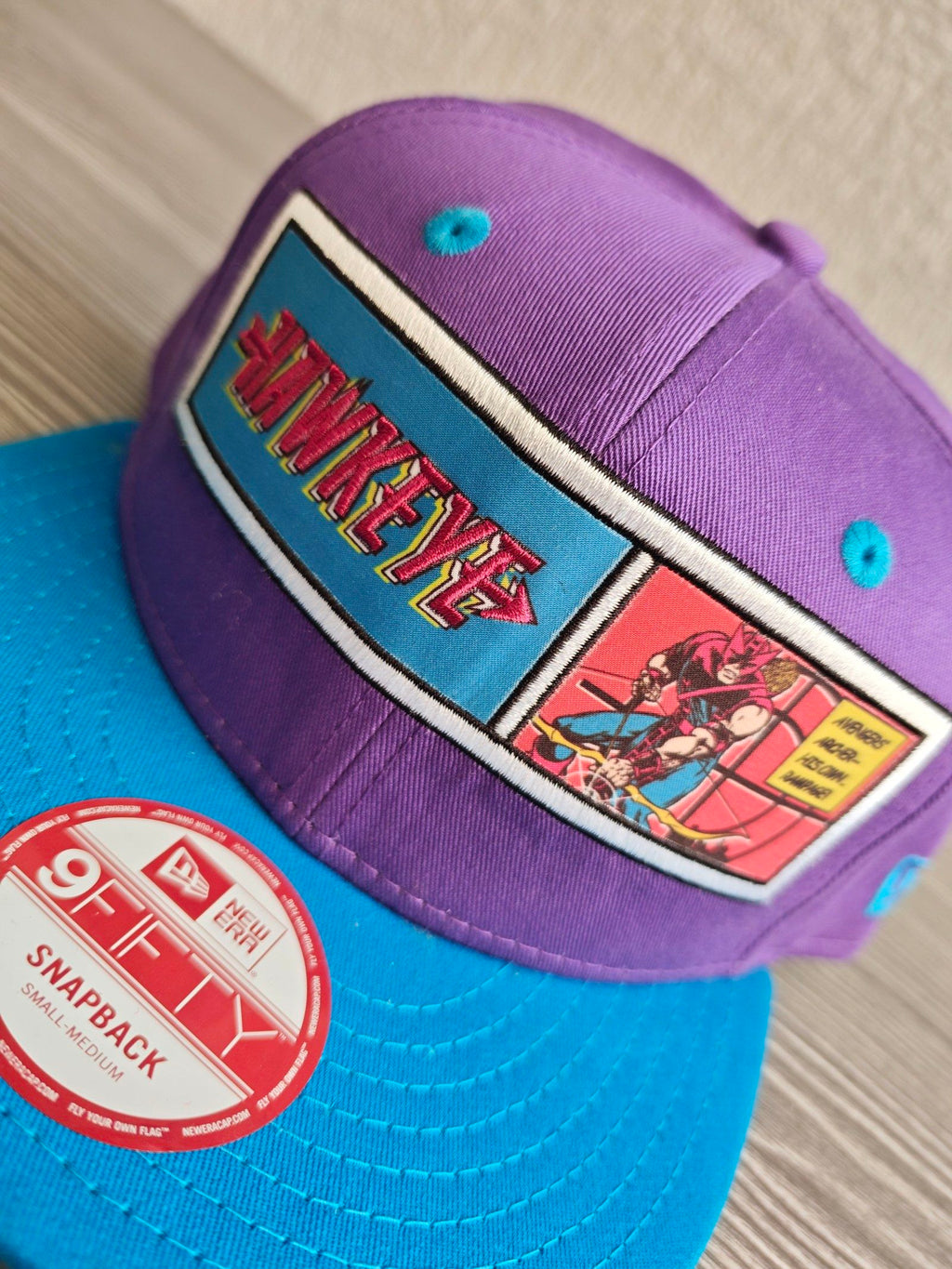 New Era snapback cap purple crown blue brim Marvel Hawkeye patch embroidered logo