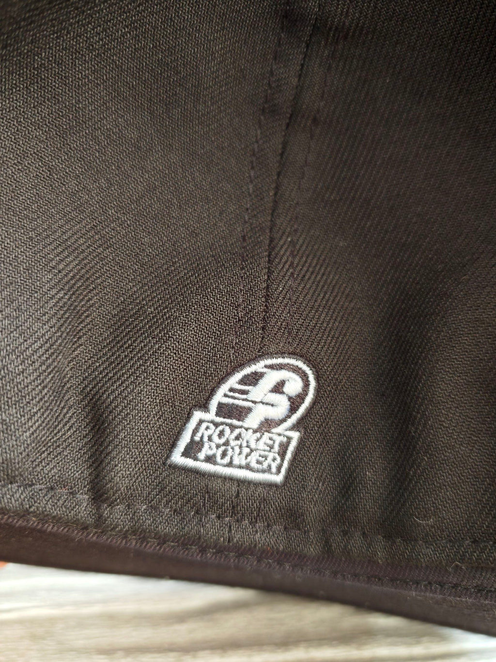 New Era black fitted cap with Rocket Power character embroidery and colorful details.