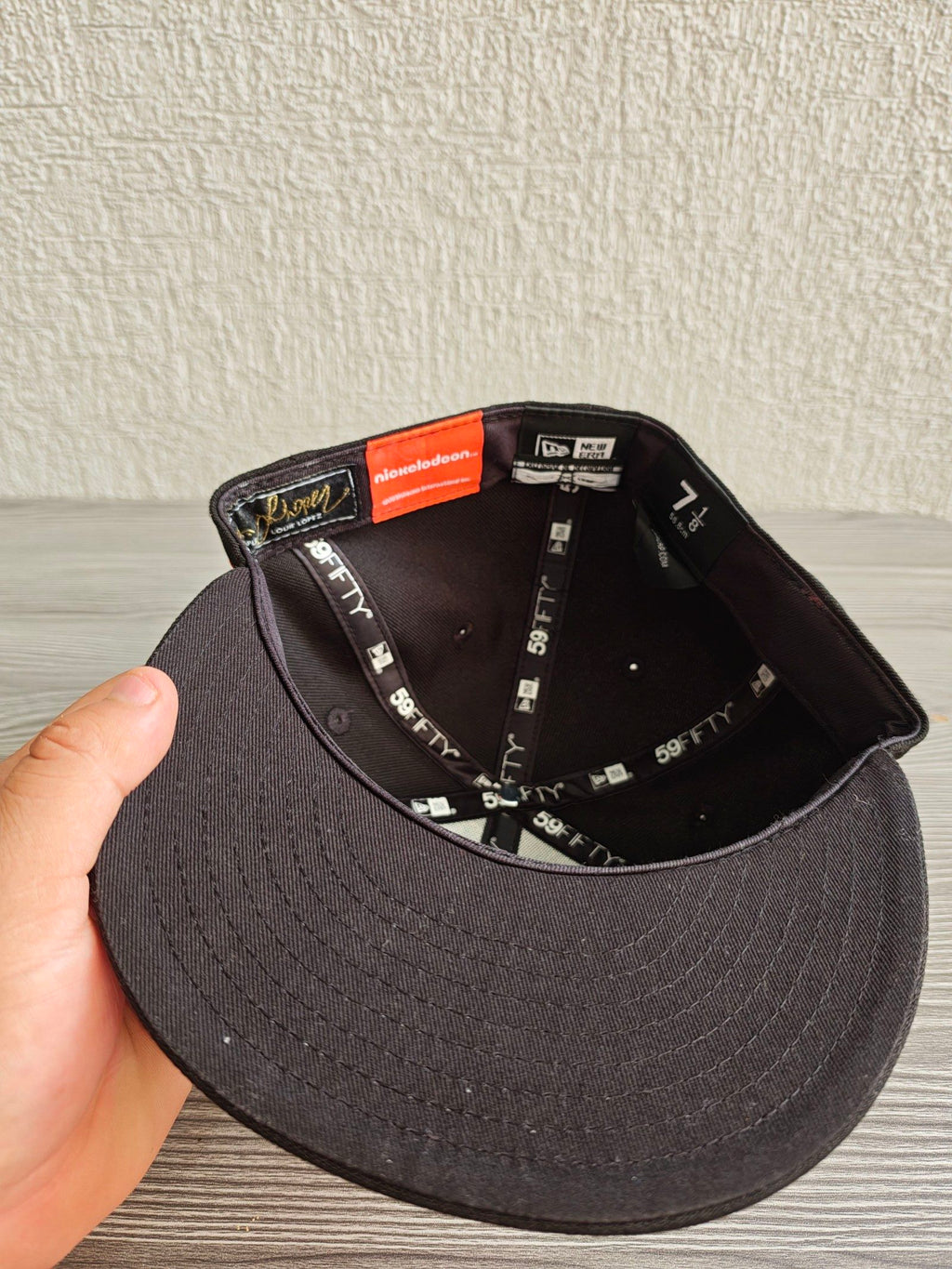 New Era black fitted cap with Rocket Power character embroidery and colorful details.