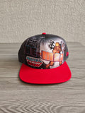 New Era grey snapback cap with red flat brim and Masters of the Universe graphic.