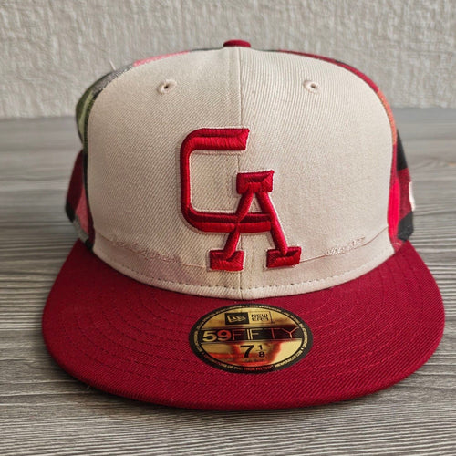 New Era red and cream fitted cap with CA logo and multicolored plaid pattern.
